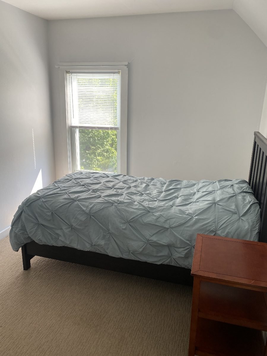 Second bedroom with garden view window