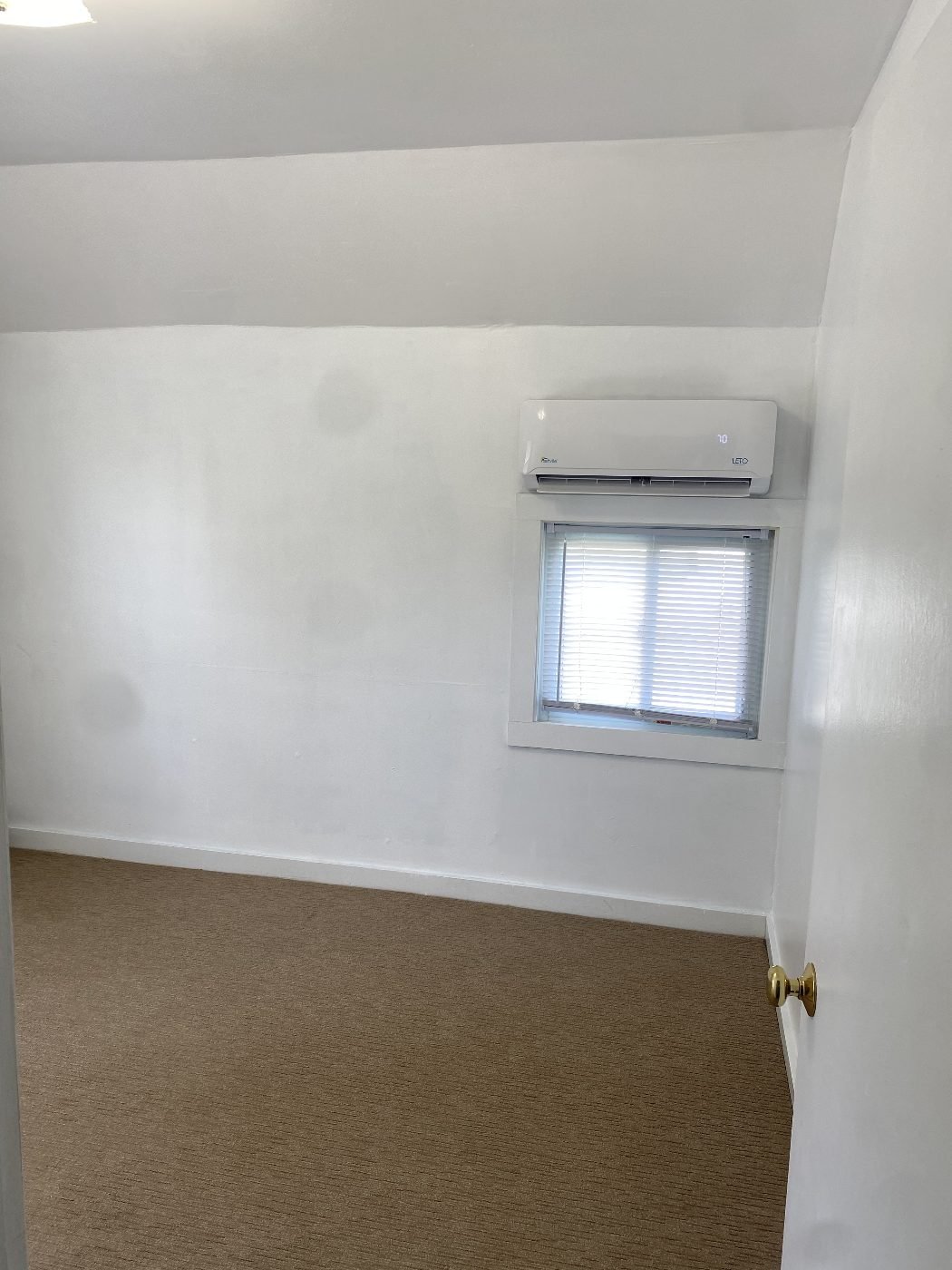 Third bedroom mini-split heat pump above the window